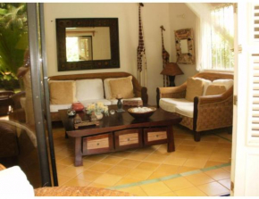 Charming Caribbean style villa near superb beach